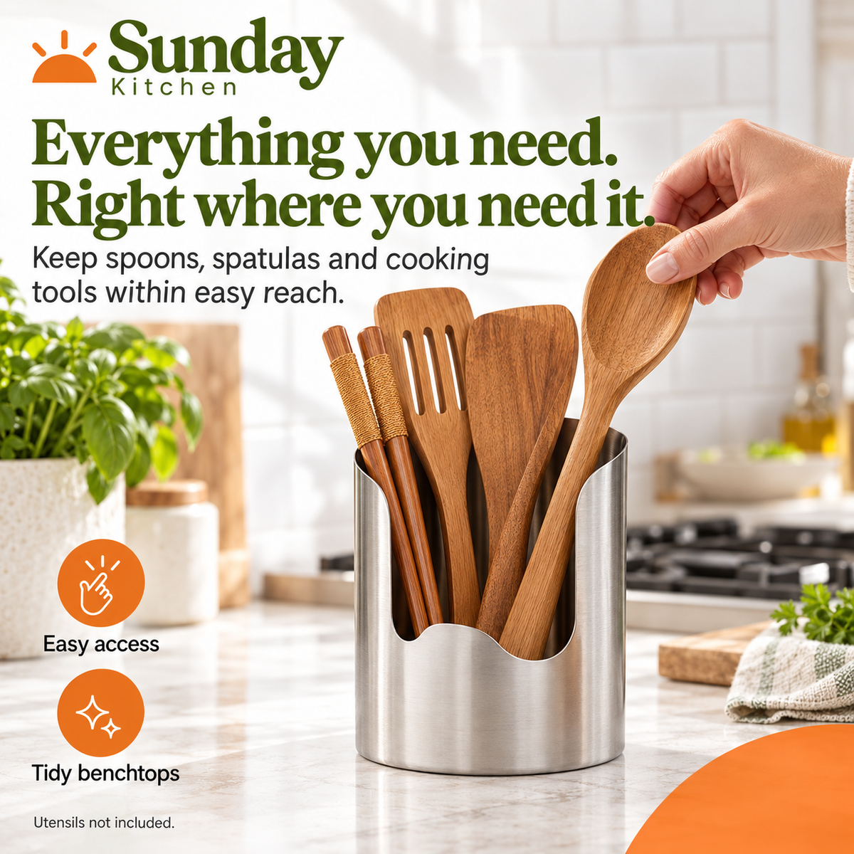 Stainless steel organiser holding wooden kitchen utensils